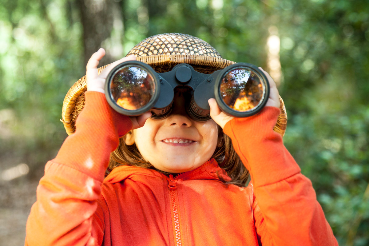 Child with binoculars